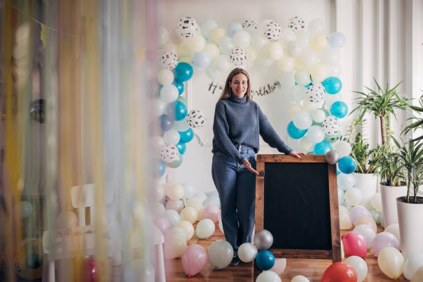 istock Party decorator portrait while arranging birthday decoration 1364595125