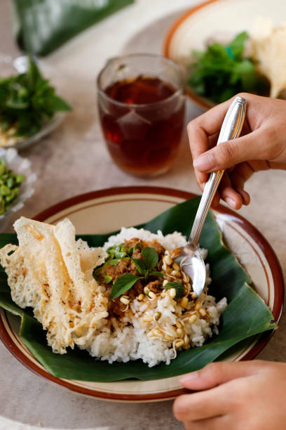 istock Nasi Sambal Tumpang with Peyek, Traditional Dish from Kediri, East Java. 1364597498