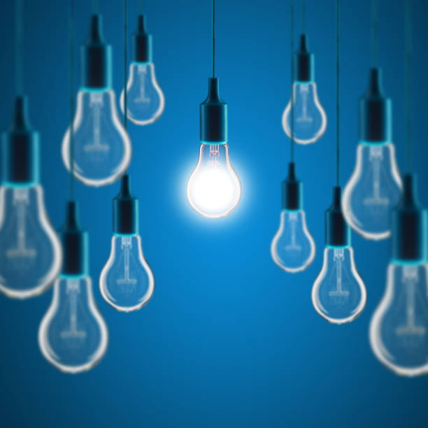 istock Idea and teamwork concept - Vintage incandescent bulbs on color background 1364598737