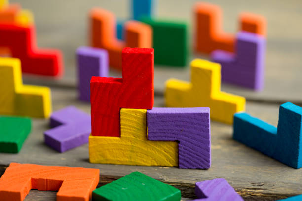 istock Creative solution for idea - business concept, jigsaw puzzle on the wooden desk 1364599048