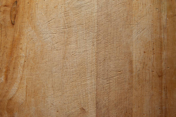 istock Surface of wooden cutting board, top view. Empty space. Place for text, design, presentation, for pictures of dishes in the restaurant. Food advertising. Texture of wooden chopping block 1364599400