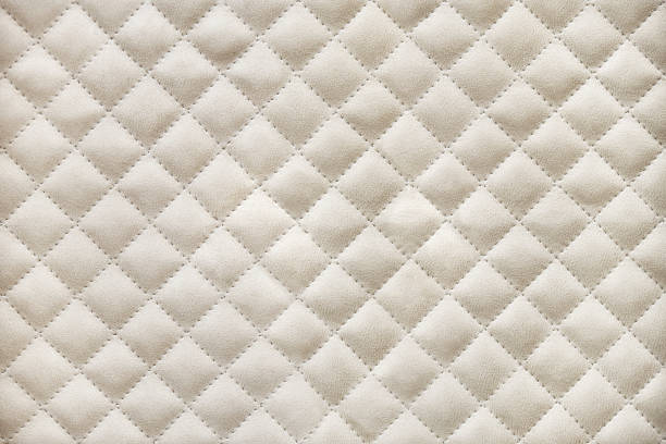 armario revestido con alcántara beige por patrón de rombo - textile quilt pattern textured fotografías e imágenes de stock