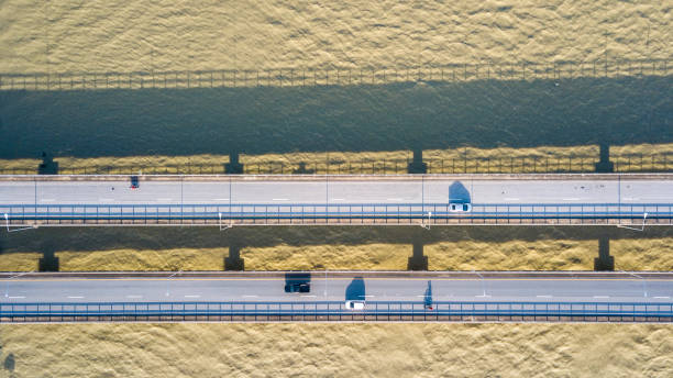 istock High angle view of concrete bridge across the sea 1364606577
