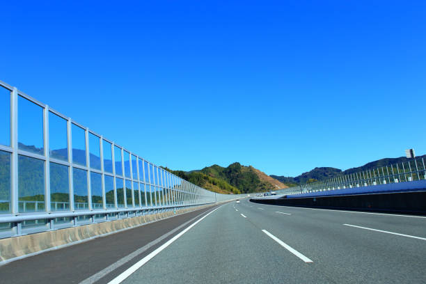 istock Driving on the highway in autumn 1364606897
