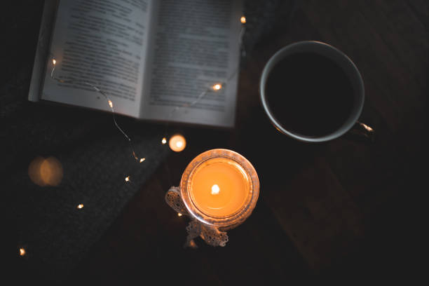 istock Cosy home atmosphere with coffee and scented candle 1364606971
