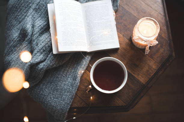 istock Cosy home atmosphere with coffee and scented candle 1364606992
