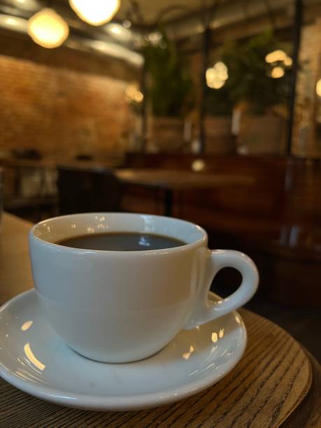 istock cup of coffee on wooden table 1364607799
