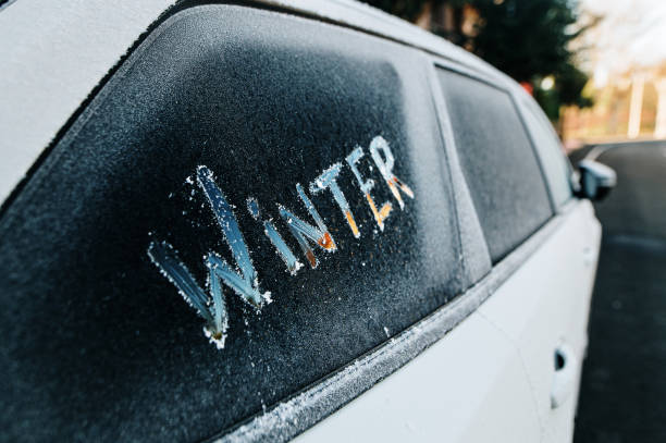 istock Winter written on a car with frost 1364612823