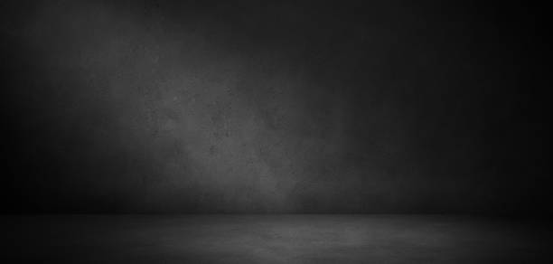 istock dark concrete wall and floor background, three dimensional room for mock up or product display 1364613637