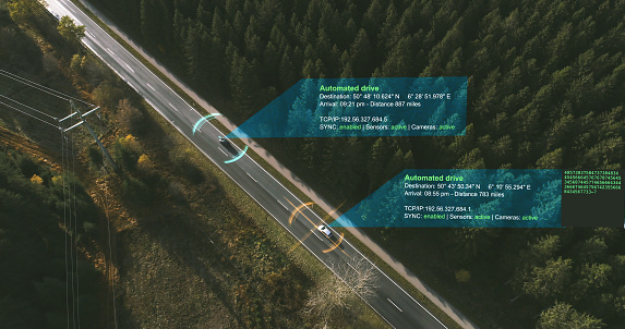 Autonomous Electric car driving on a forest highway with technology assistant tracking information, showing details. Visual effects clip