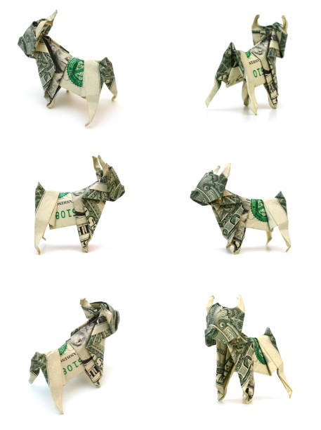 istock dollar origami dog on white 1364618747