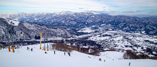 Downhill skiing in Hakuba Valley in Japan