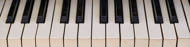 old black and white piano keys stock photo
