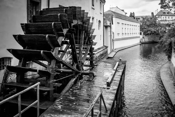 Historic Water Mill in Prague, Czech Republic. Black and white photography, cityscape