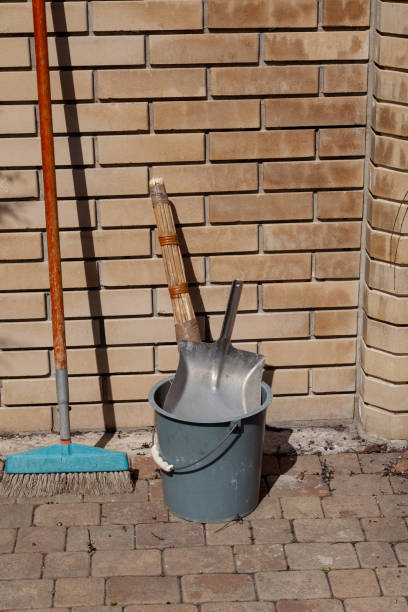 istock Bucket with scoop stands in front of  brick wall 1364635062