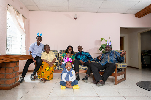 Easter portrait of African family in living room