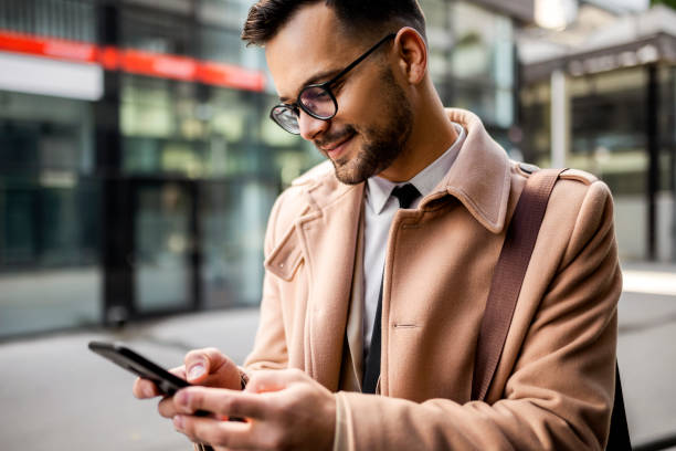 istock Young businessman using phone 1364638711