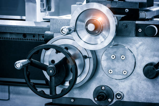istock Lathe control knobs close up. Metal machine tools industry. The metalworking process by turning machine. 1364639481