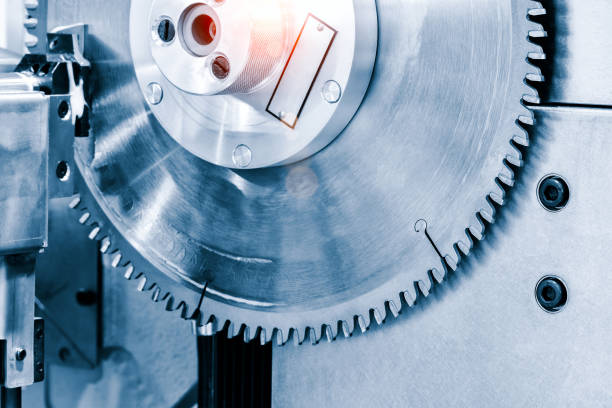 istock Automatic disksaw sawing metal workpiece, industrial concept background 1364639501