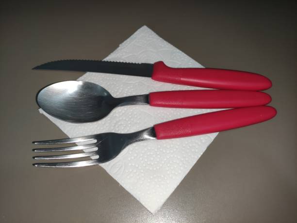 istock red cutlery on napkin left angle 1364639771