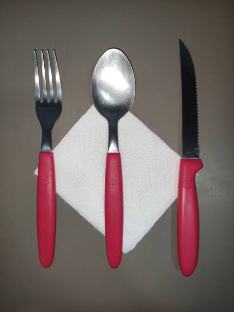 istock red cutlery on napkin top angle 2 1364639773