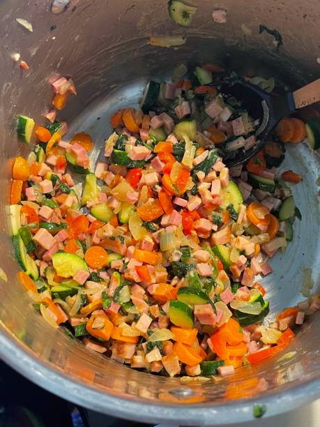 istock Preparing vegetables for Homemade Bean Soup with Ham and Vegetables 1364639778