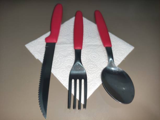 istock red cutlery on napkin upper angle 1364639854