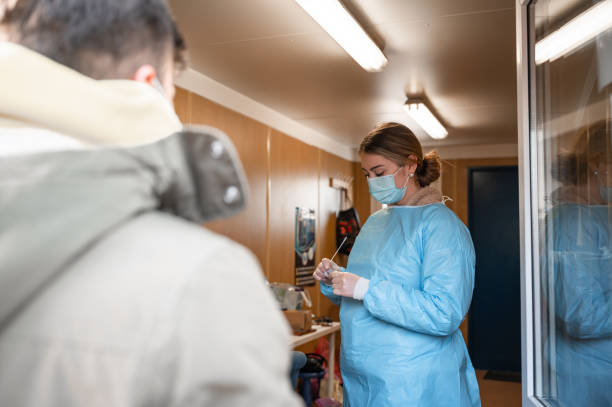 istock Young man waiting to get tested for coronavirus/Covid-19 1364639931