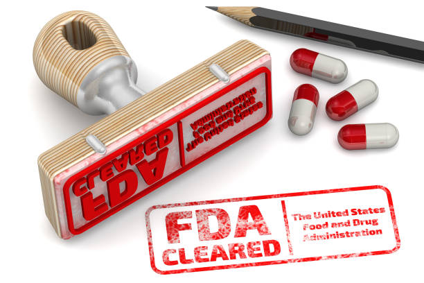 FDA cleared. The stamp and an imprint Red stamp and an imprint "FDA CLEARED" on white surface. FDA - U.S. Food and Drug Administration is a federal agency of the United States Department of Health and Human Services. 3D illustration food and drug administration photos stock pictures, royalty-free photos & images