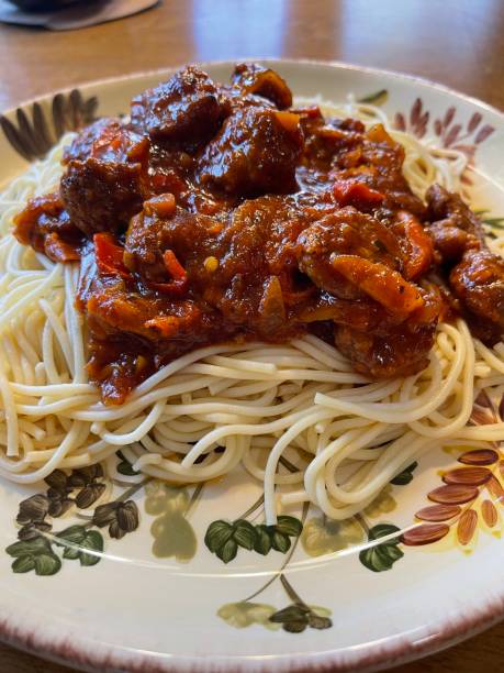 istock Sausage and peppers with spaghetti dinner meal 1364642013