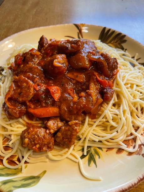 istock Sausage and peppers with spaghetti dinner meal 1364642018