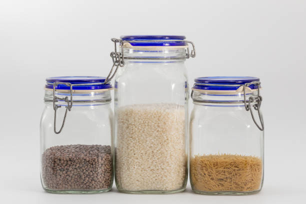 istock pantry jars with rice, lentils and noodles 1364643957