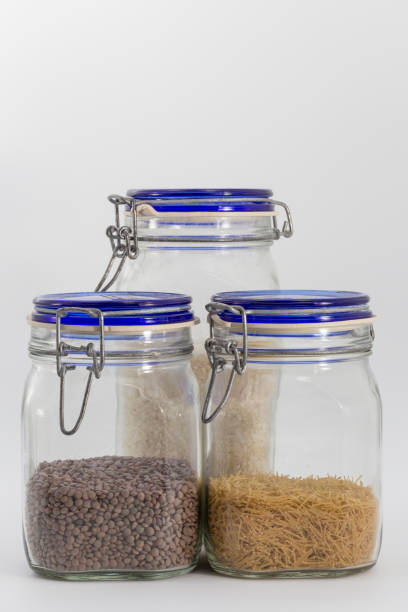istock pantry jars with rice, lentils and noodles 1364643974