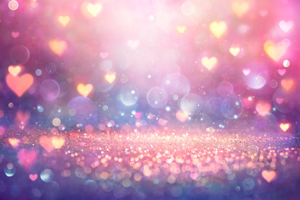 Valentines Shiny Pink Glitter Background With Defocused Abstract Lights stock photo
