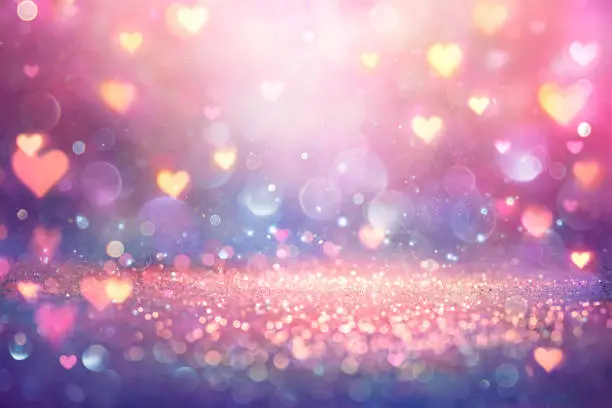 Photo of Valentines Shiny Pink Glitter Background With Defocused Abstract Lights