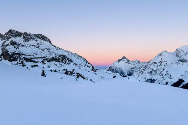Landscape in ski-resort Lech after sunset during winter. Vorarlberg, Austria