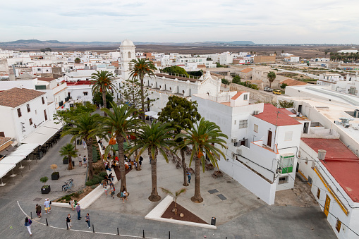 Conil de la Frontera, Cadiz, Spain - October 16, 2021: Santa Catalina square seen from the top of the Guzman tower.