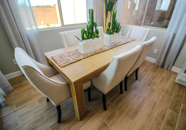 istock Dining Area Table, Centerpieces And Chairs 1364651732