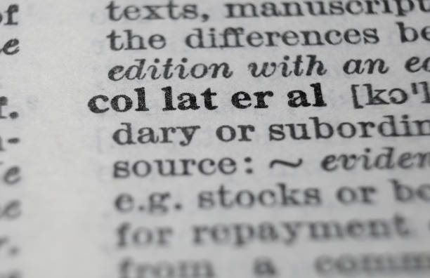 istock Collateral dictionary definition close-up. Shallow depth of field. 1364652964