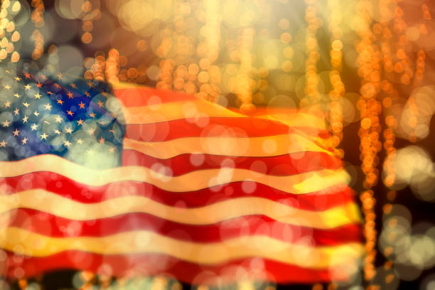 istock Close up shiny American flag with celebration light at night 1364653962