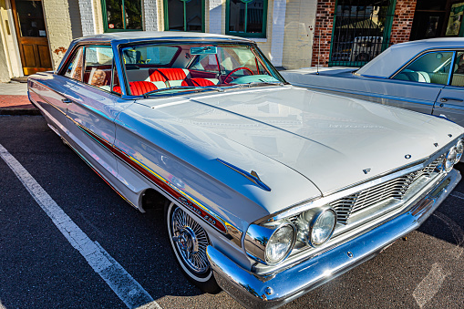 Fernandina Beach, FL - October 18, 2014: Wide angle front corner view of a 1964 Ford Galaxie 500 hardtop coupe at a classic car show in Fernandina Beach, Florida.