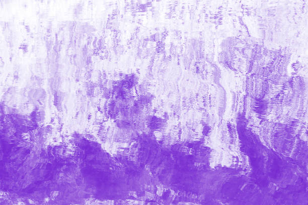 istock Natural lilac and purple background imitating watercolor. Water surface with reflections. Copy space. 1364656370