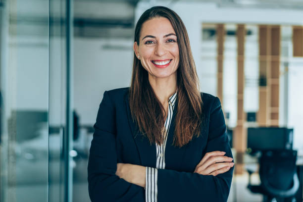 istock Confident businesswoman in modern office. 1364656966