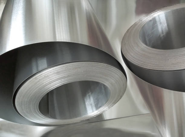deux bobines d’aluminium - rolled up foil paper gray photos et images de collection