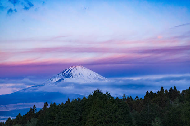 istock Mt. Fuji in the morning glow with snow 1364670601
