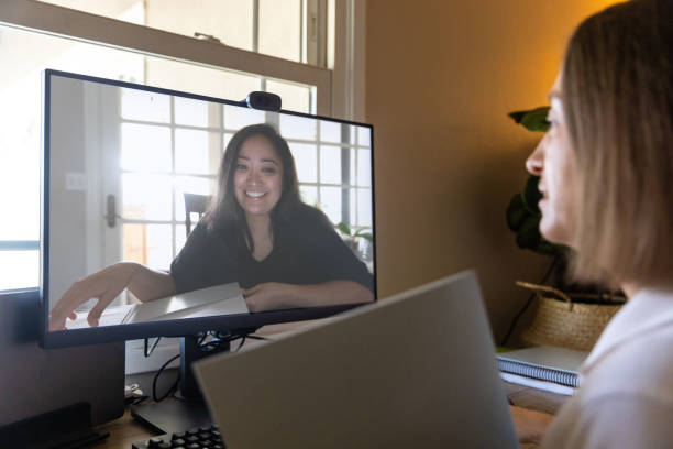 istock New York Life Agent Talking to Customer 1364671374