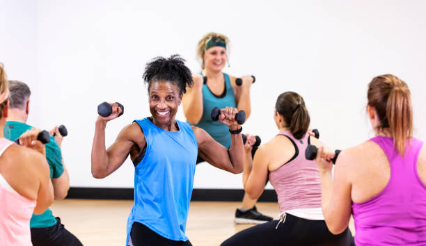 istock Senior African-American woman taking aerobics class 1364677411