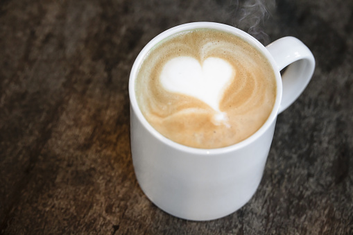 A beautiful heart symbol drawn on a latte
