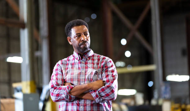istock African-American man working in warehouse 1364682191