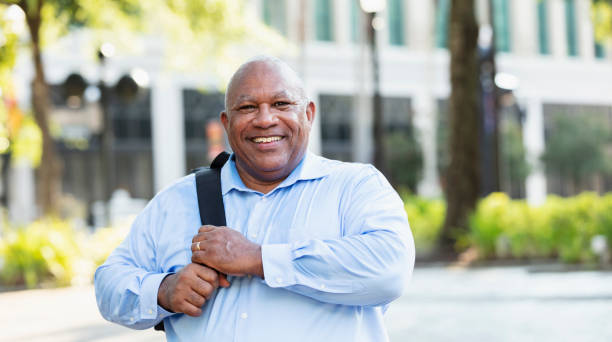 Senior black man with large build, in city